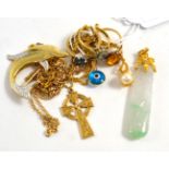 A carved jade pendant, two 9ct gold gem set rings, a paste set ring stamped '9 ct', a 9ct gold