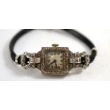 A lady's diamond set wristwatch, case inscribed inside Platinum