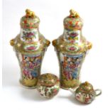 A group of 18th/19th century Canton famille rose including a pair of vases, miniature teapot and jar