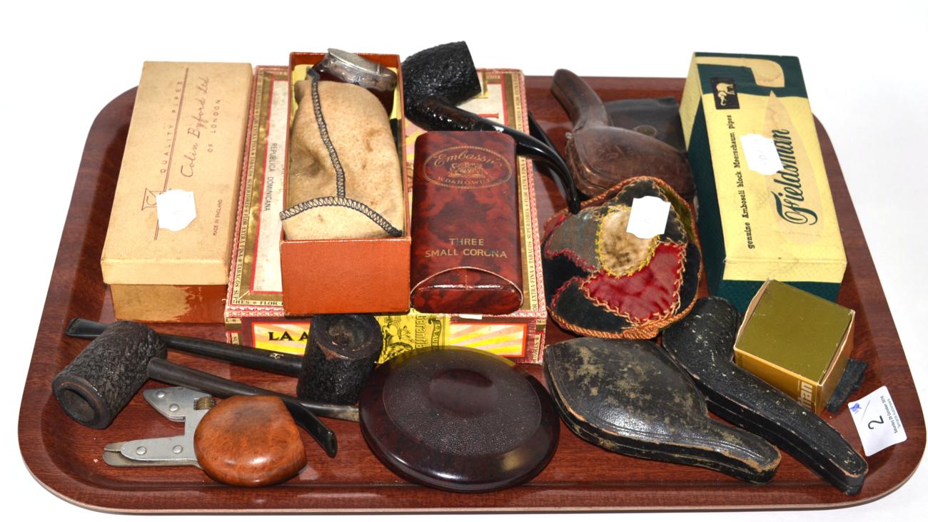 Collection of cased pipes and assorted smoking related items