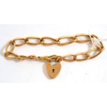 A 9ct gold bracelet with padlock clasp