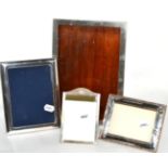 Four silver photo frames, various sizes, dates and makers (4)