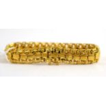 An 18ct gold fancy link bracelet