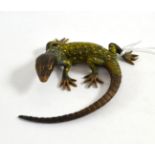 A cold painted bronze of a lizard