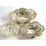 Three silver pierced bonbon dishes