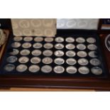 Cased collection of silver medallions, the Ancient counties of England