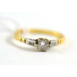 A diamond three stone ring (worn) principal diamond weight 0.20 carat approximately