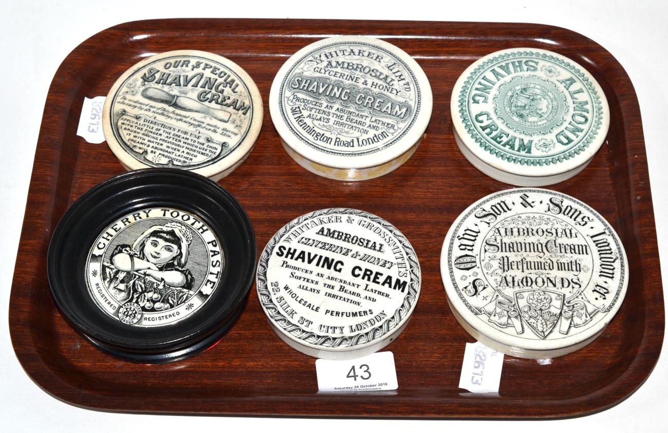 A group of six various Pratt Ware pot lids, including shaving cream