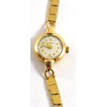 A lady's wristwatch with 9ct gold bracelet