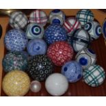 A good collection of ceramic carpet boules