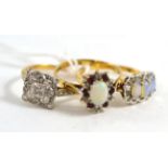 A 9ct gold opal three stone ring; a 9ct gold opal, garnet and diamond cluster ring and an illusion