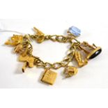 A 9ct gold curb link charm bracelet, with attached 9ct gold charms