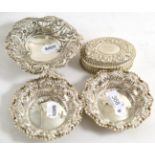 A silver hinged box, pair of silver circular bonbon dishes and a silver pierced bonbon dish