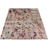 19th Century Patchwork Cover, comprising coloured printed cottons worked in triangular shapes,