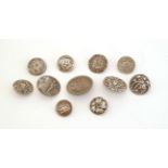 Eleven Pierced and Embossed Early 20th Century Silver Buttons, of various designs