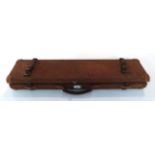 A Canvas Covered Gun Case by Cogswell & Harrison, London, with fitted interior, leather straps,