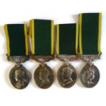 Four Efficiency Medals with Territorial Suspender Bars, one George V awarded to 745509 SJT.W.