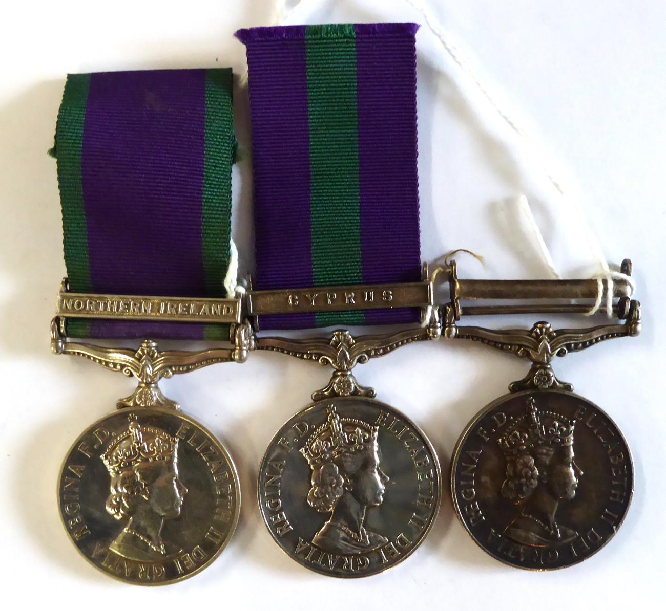 Two General Service Medals, 1918-62, one lacking clasp awarded to 23447748 SIGMN.W.DAVIS. R.SIGS.