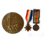 A First World War Memorial Plaque and Pair of Medals, comprising 1914-15 Star and British War Medal,