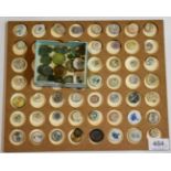 A Collection of Fifty Nine Chinese Porcelain Gaming Tokens, blue and white, and polychrome, also