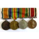 A First/Second World War Group of Four Medals, awarded to 127066 PTE.H.T.ROBINSON. M.G.C.,