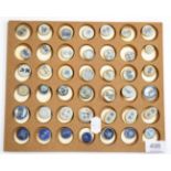 A Collection of Forty Two Chinese Porcelain Gaming Tokens, blue and white, oval and circular, of