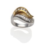 A Diamond Two Colour Ring, the split scroll top with round brilliant cut diamonds in a yellow