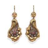 A Pair of Ruby and Diamond Earrings, a round cut ruby in white rubbed over setting, within a