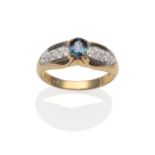 A Sapphire and Diamond Ring, an oval cut sapphire in a yellow claw setting, to white eight-cut