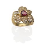 A Ruby and Diamond Leaf Motif Ring, a pear cut ruby in a yellow claw setting with pavé set round