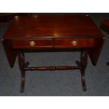 A Reproduction Mahogany Drop Leaf Sofa Table, labelled J Sydney Smith, fitted two frieze drawers,