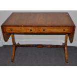 A Regency Style Satinwood and Rosewood Crossbanded Sofa Table, with two oak lined frieze drawers