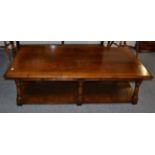 A Titchmarsh & Goodwin Oak Coffee Table, of large proportions, the rectangular top raised on