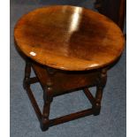 A Titchmarsh & Goodwin Oak Circular Occasional Table, with a square shelf below and turned spindle