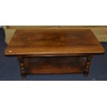 A Titchmarsh & Goodwin Oak Coffee Table, the plank top above spindle turned supports joined by a