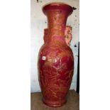 Chinese floor vase, baluster shape with trumpet neck and dragon handles in a pink lustrous glaze &