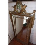 Ornate pier mirror with gilt frame