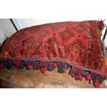 Old Persian carpet floor cushion with tassels