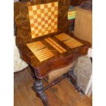 Victorian burr walnut serpentine fold-over and swivel-top games/sewing table on carved legs with