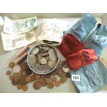Coins including mint rolls of half-pennies, a George V ten-shilling note, and other coins