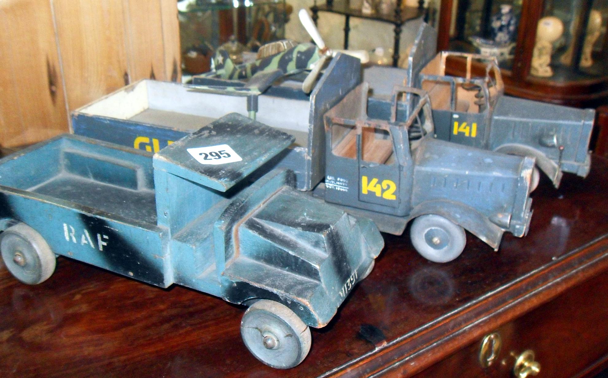 Three WW2 scratch-built wooden models of lorries/trucks, one marked "RAF", the others "GLEICH",