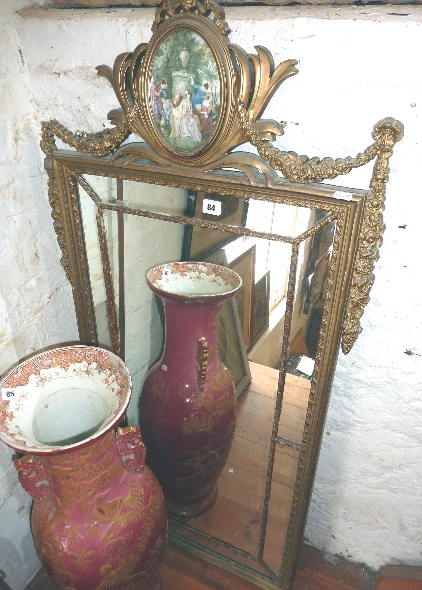 Ornate pier mirror with gilt frame