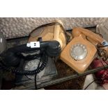 Three old telephones