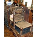 Pair of Indian carved & fretwork hardwood chairs with woven string seats