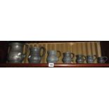 Seven-piece set of old graduated pewter measures