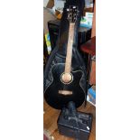 Tanglewood acoustic guitar with case, a small B.C. Rich amp and microphone