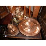 Large copper charger with stamped pattern, a copper Guernsey cream jug, copper kettle and a brass