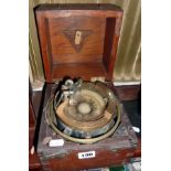 Brass nautical sighting compass on gimbals, in mahogany box