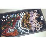 Tray of assorted costume necklaces