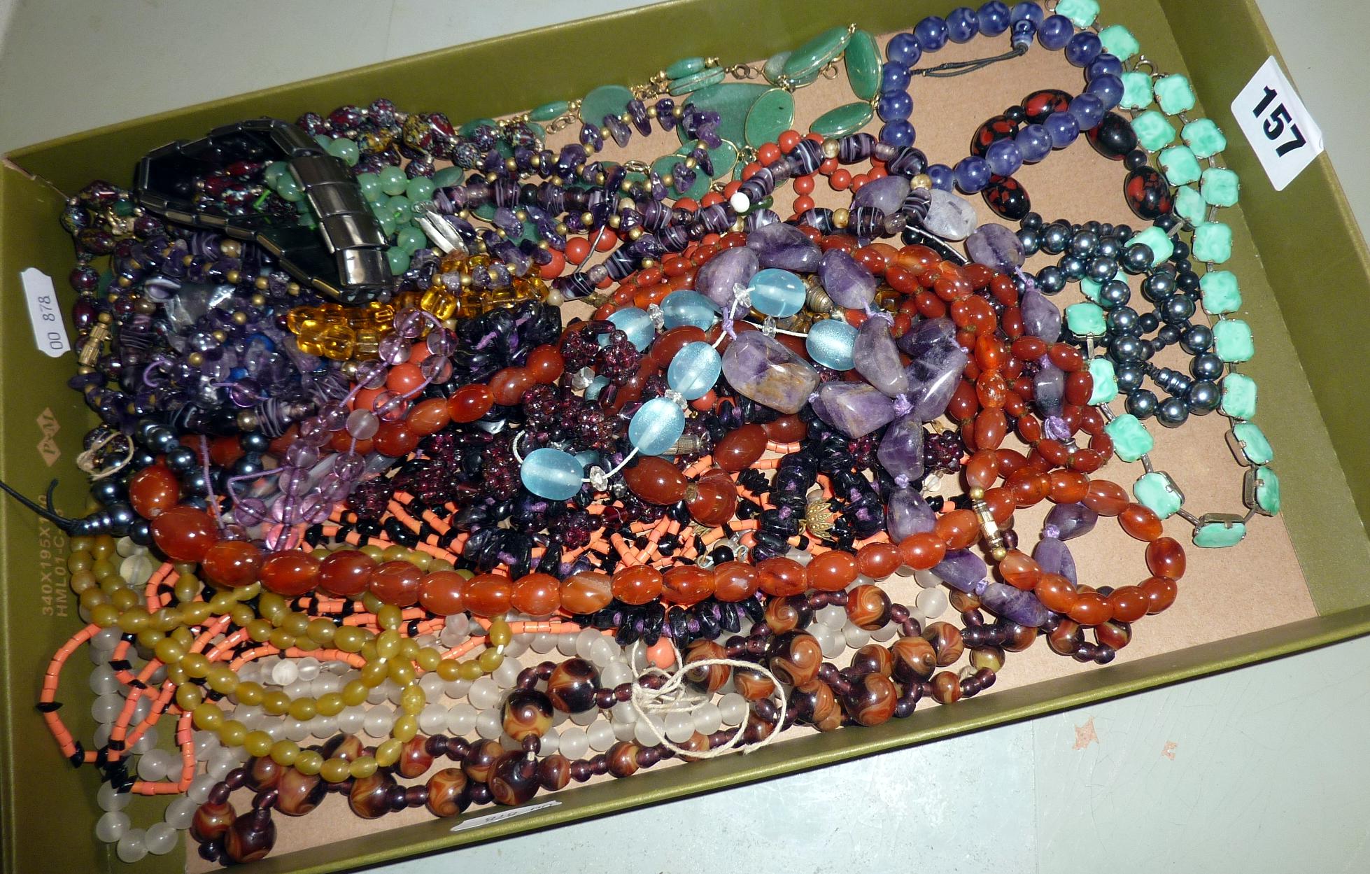 Quantity of assorted necklaces including jadeite, glass, amber, quartz etc